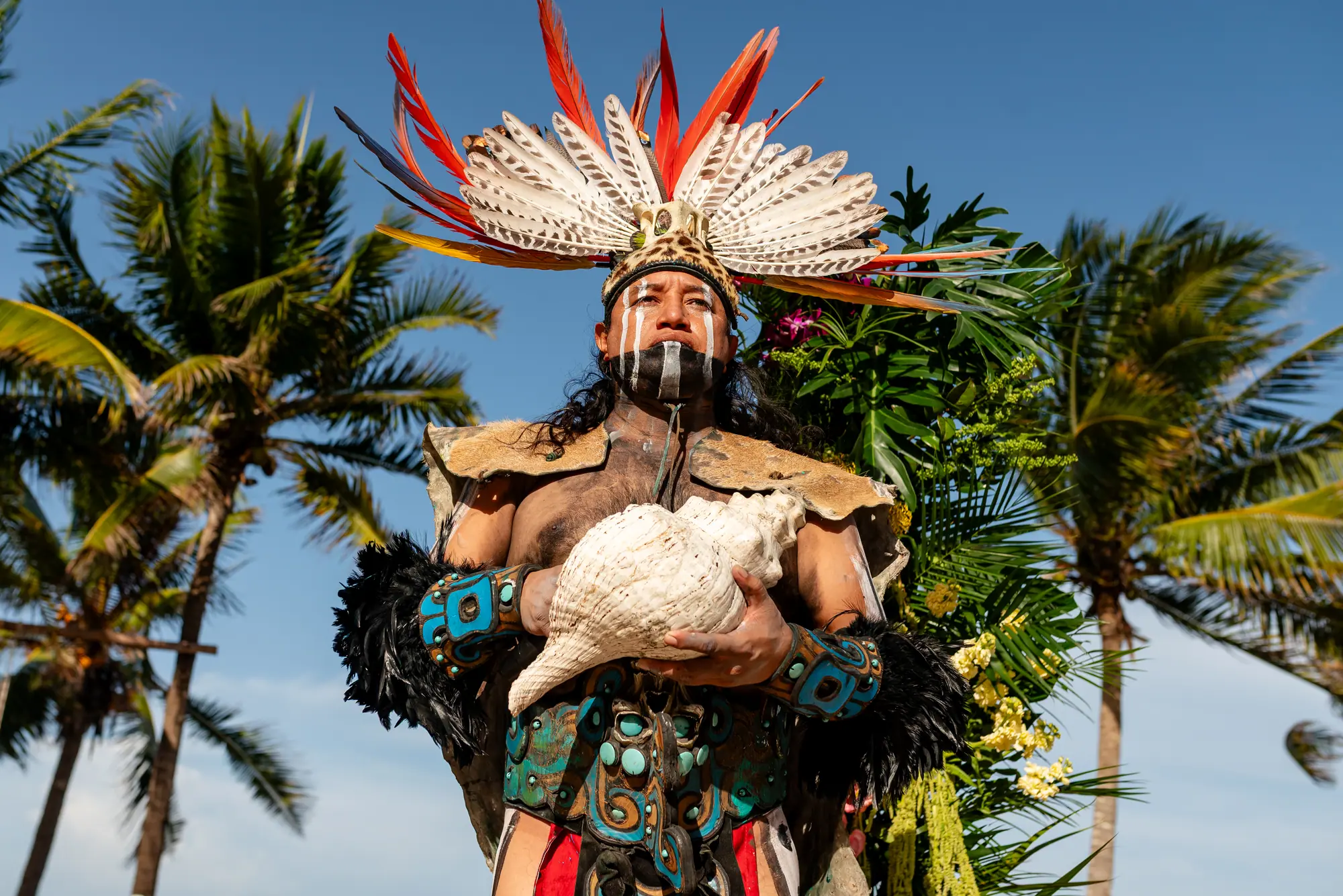 Maya wedding ceremony with a conch shell during an intimate Riviera Maya destination wedding